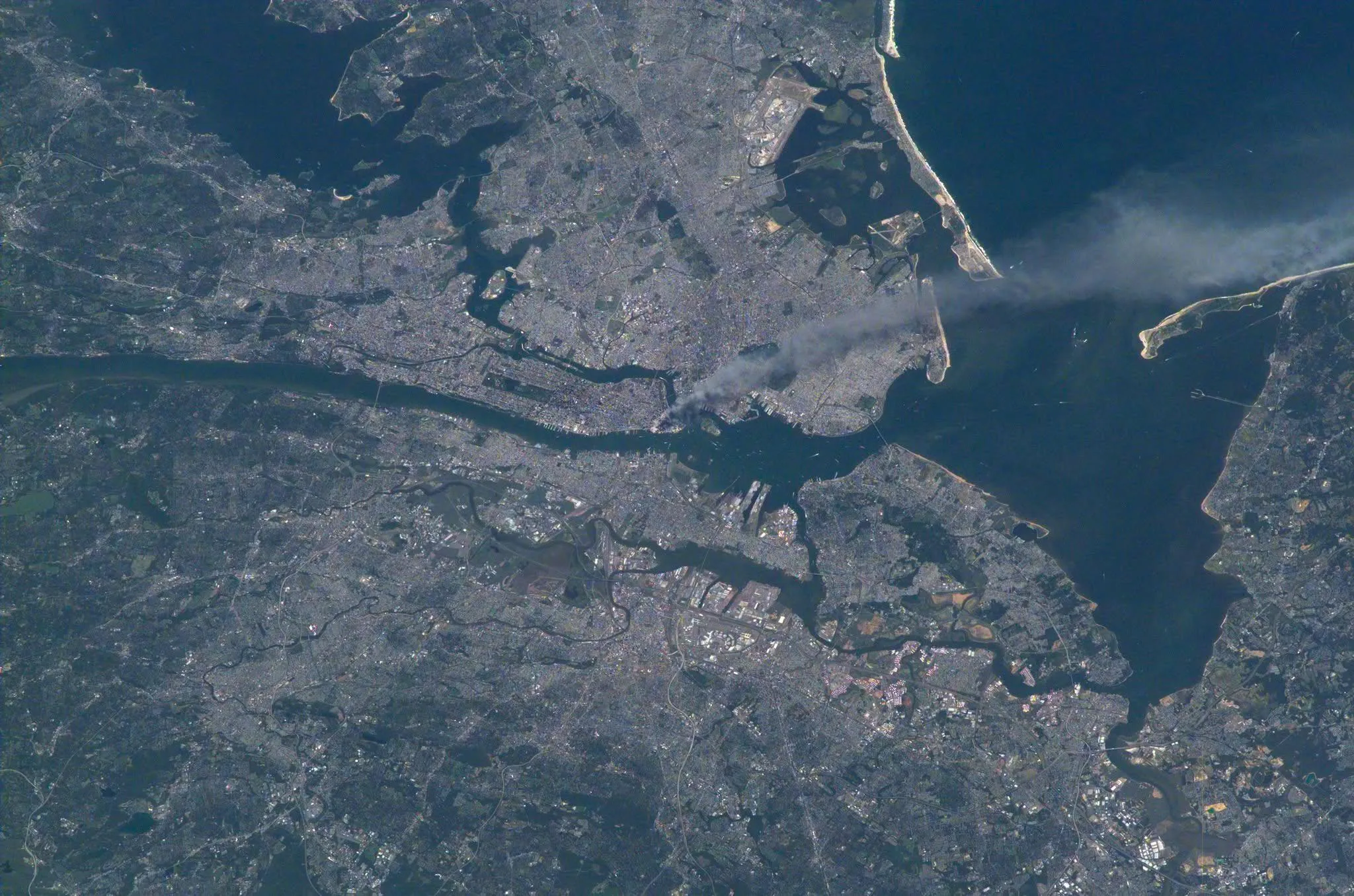 This eerie image, captured by a NASA astronaut shortly after the second tower fell on Sept. 11, 2001, shows a giant plume of smoke blowing across New York City. Image credit: NASA / Astronaut Frank Culbertson