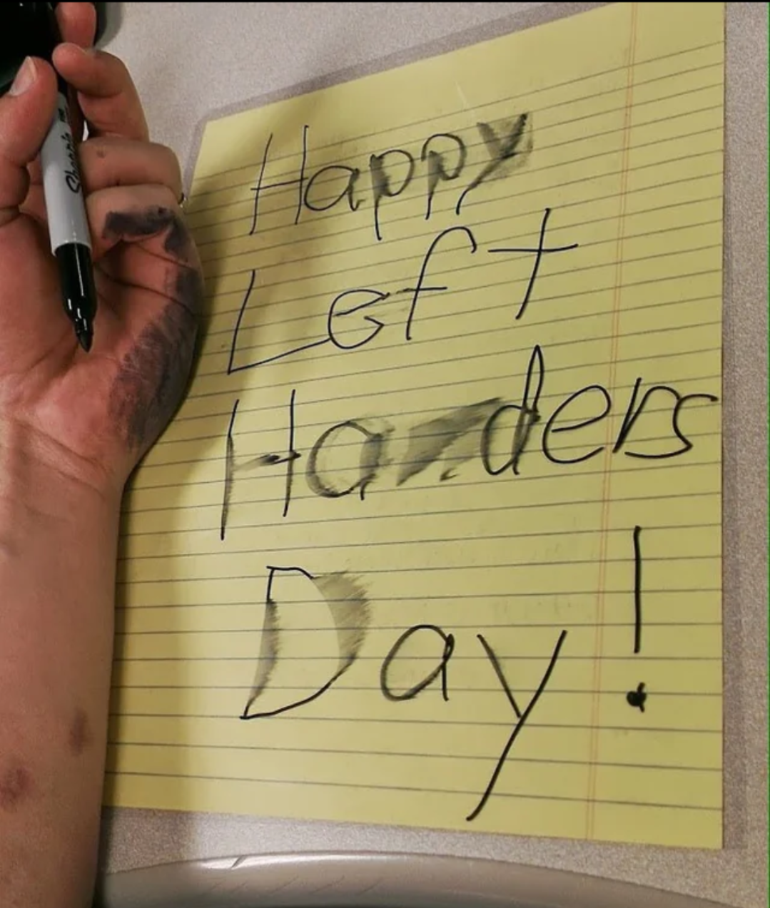 Happy Left Handers Day written by a lefty and the ink is smeared. (shamelessly stolen)